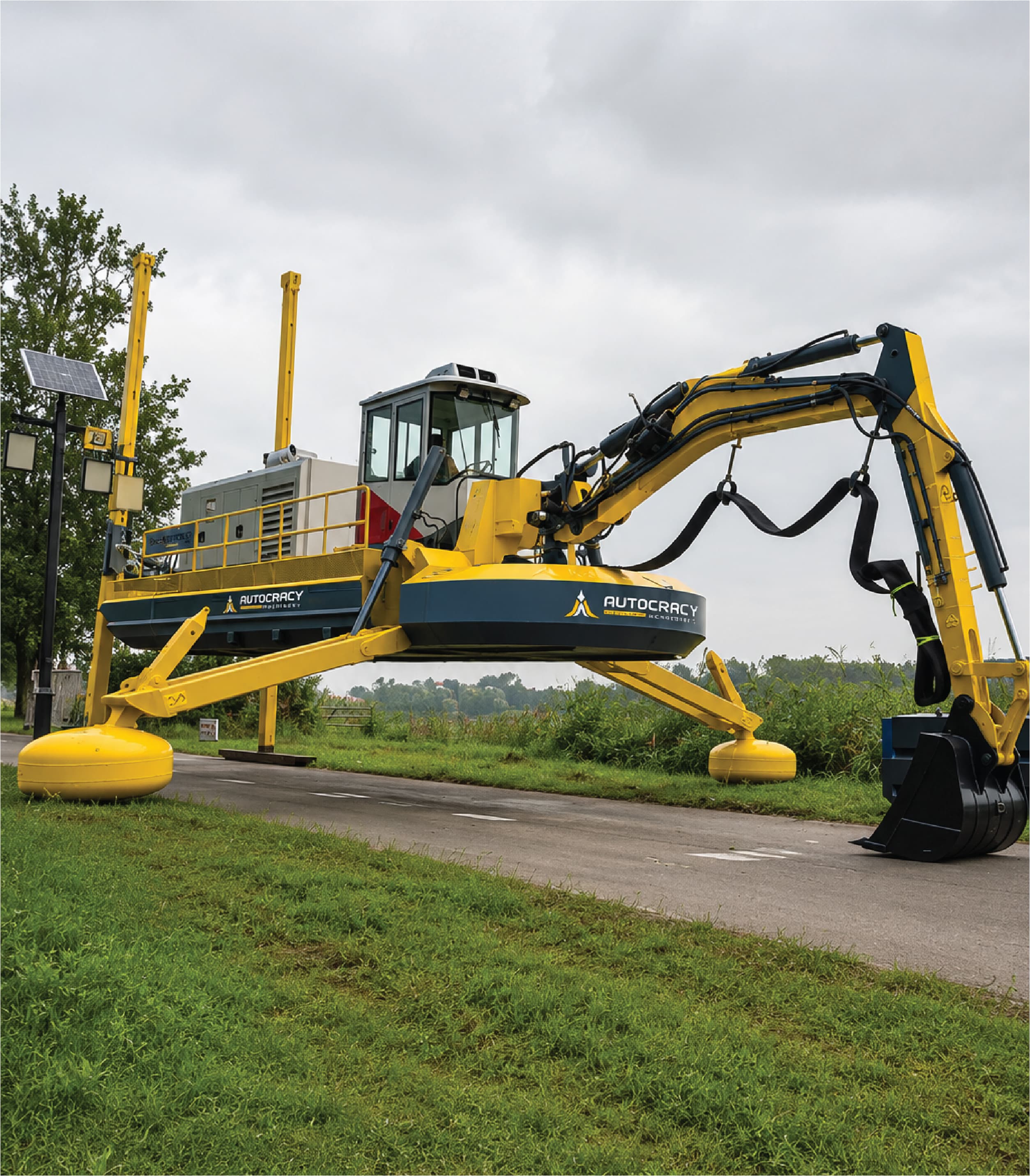 Autocracy Machinery amphibious dredger with excavator boom and stabilising legs